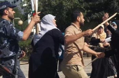 (راصد) تستنكر قيام أجهزة حكومة حماس البوليسية بالإعتداء على المسيرة النسائية في غزة